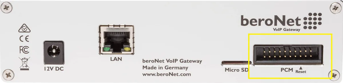 Rear panel of a beroNet gateway: 12V DC power socket, LAN port, Micro SD slot and the PCM connector with the Reset mark, framed in yellow