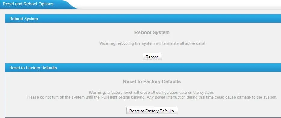 The “Reset and Reboot Options” page: the Reboot System block with a Reboot button and the Reset to Factory Defaults block with a warning about erasing the configuration